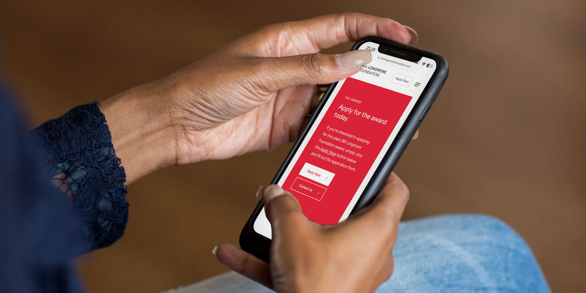 Mobile website for sports foundation shown on iPhone – inclusive, accessible web design for Shropshire nonprofit.