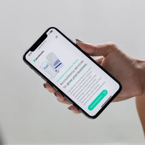 Mobile-friendly website for Skipton accountancy firm displayed on iPhone – responsive web design by Shrewsbury-based designer. Cropped slim.
