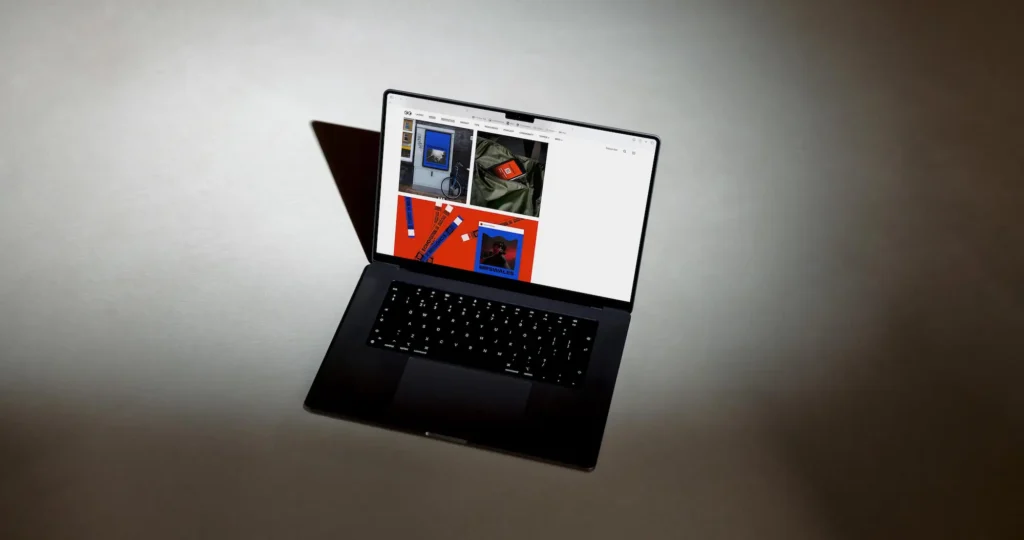 Studio Payne featured on Creative Boom, dark laptop on light background, showcasing Shropshire web design and branding expertise