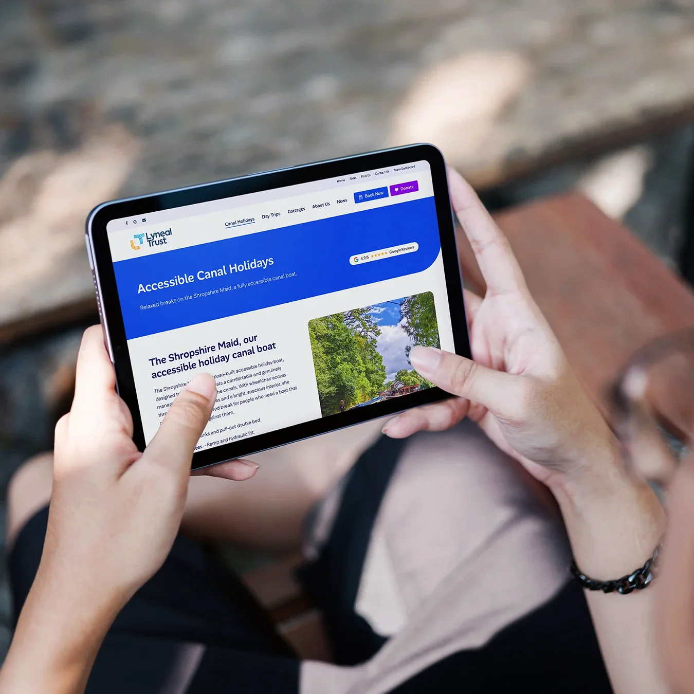 Lyneal Trust canal holidays page displayed on iPad — clean, modern accessible web design