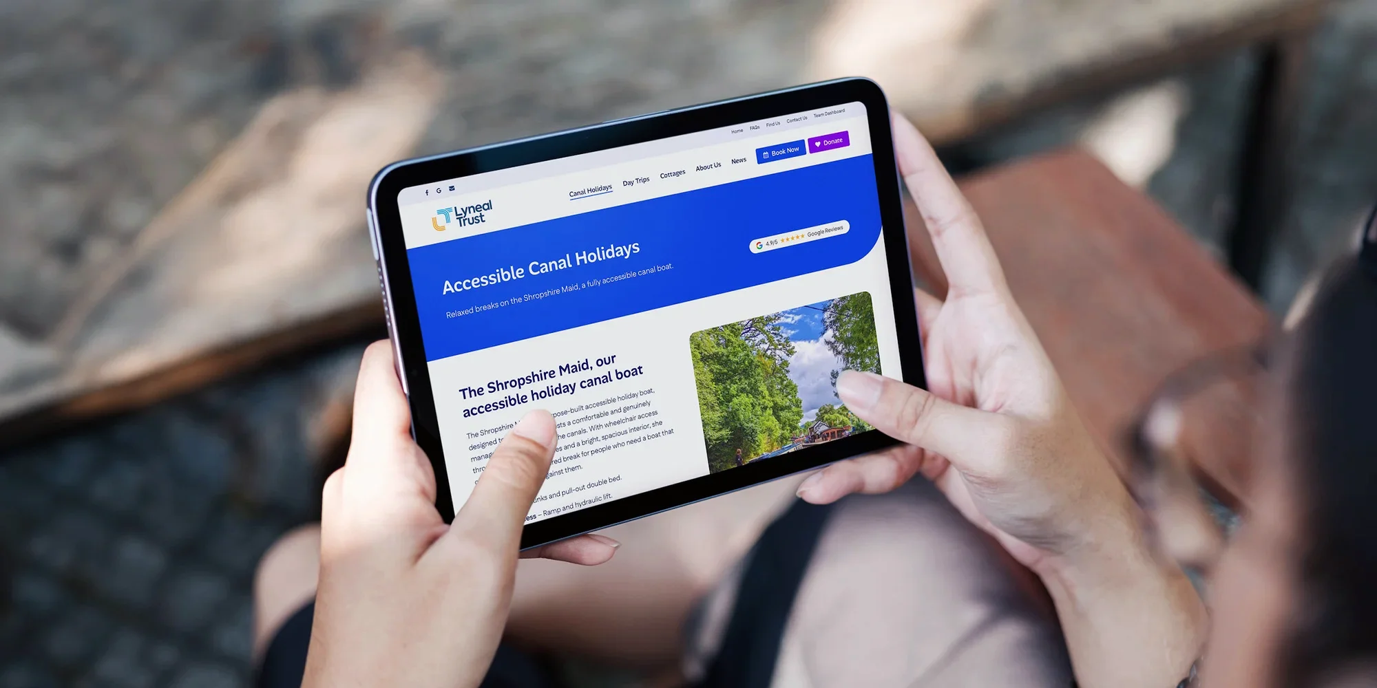 Lyneal Trust canal holidays page displayed on iPad — clean, modern accessible web design