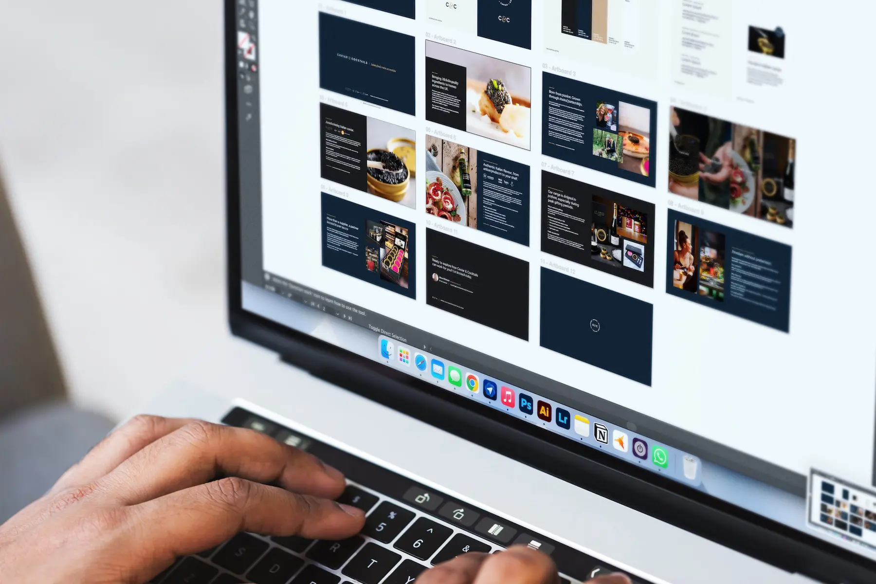 Professional graphic designer working on a document presentation design in Shrewsbury with a consistent premium brand identity